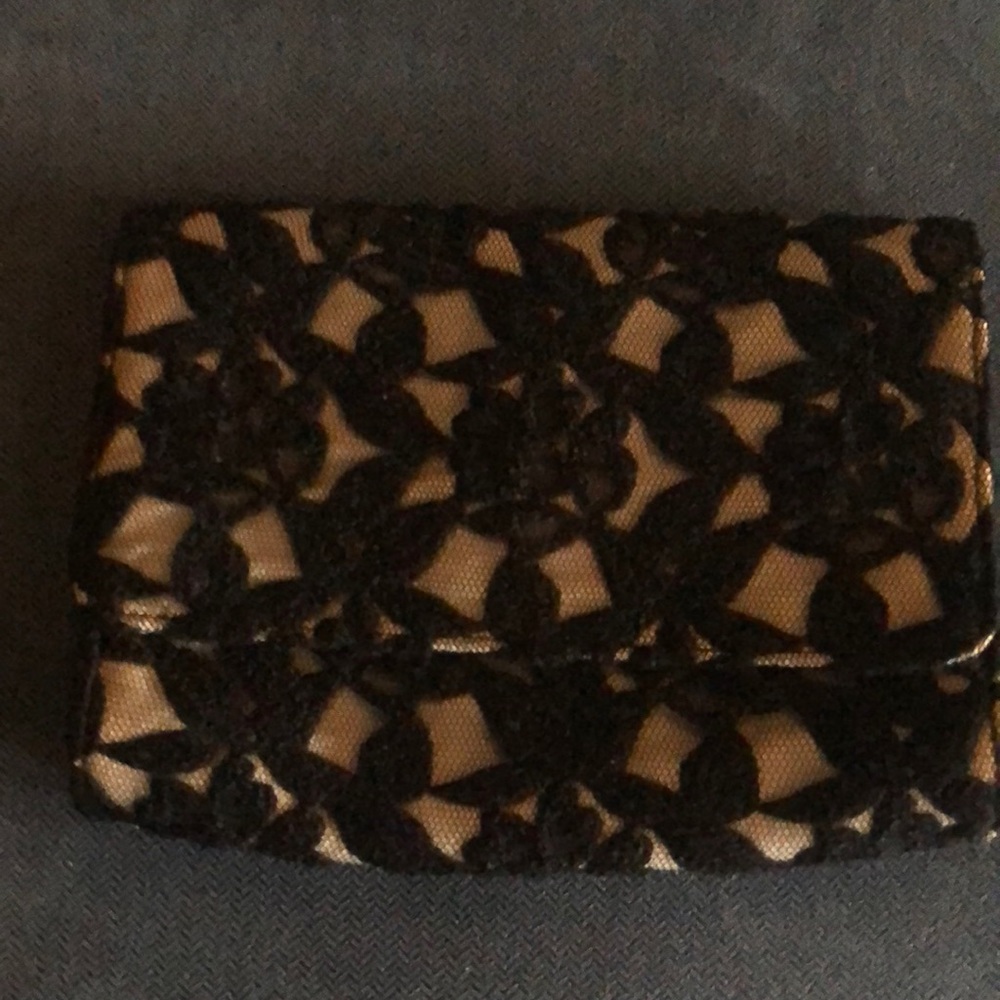 Neiman Marcus black lace and beige clutch